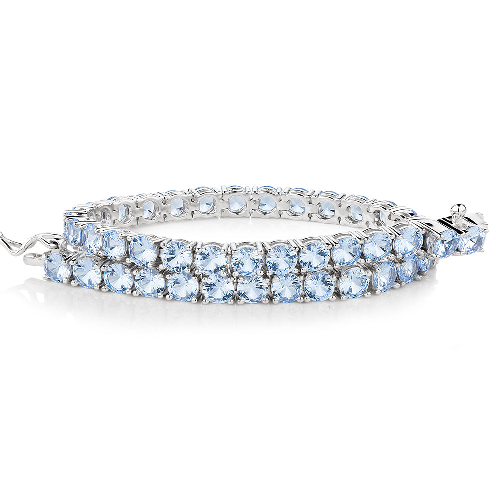 Round Brilliant tennis bracelet with aquamarine simulants in sterling silver