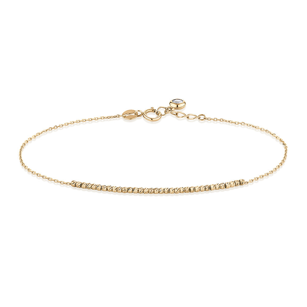 Bracelet with diamond simulant in 10 carat yellow gold