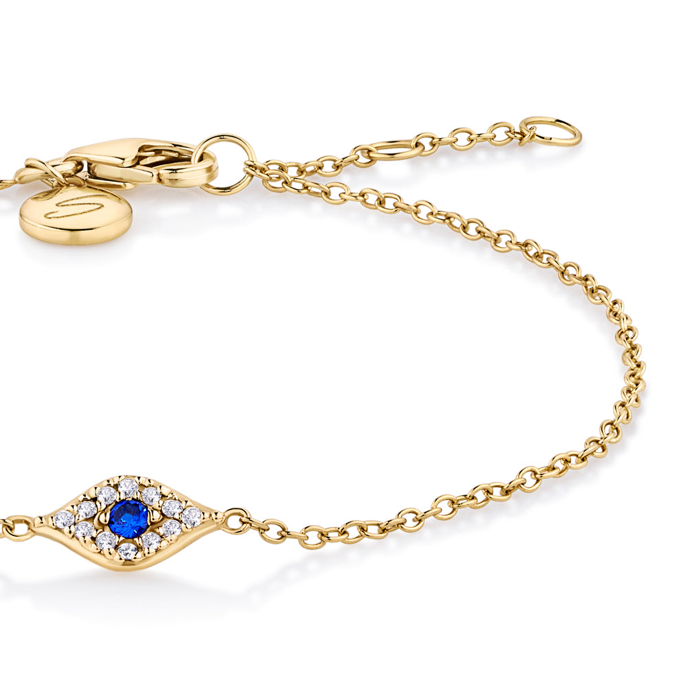 Round Brilliant Signature Simulant and Sapphire Simulant evil eye bracelet in 18 carat yellow gold vermeil