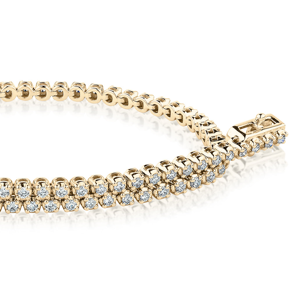Premium Lab-Grown Diamond, 0.70 carat TW round brilliant tennis bracelet in 10 carat yellow gold