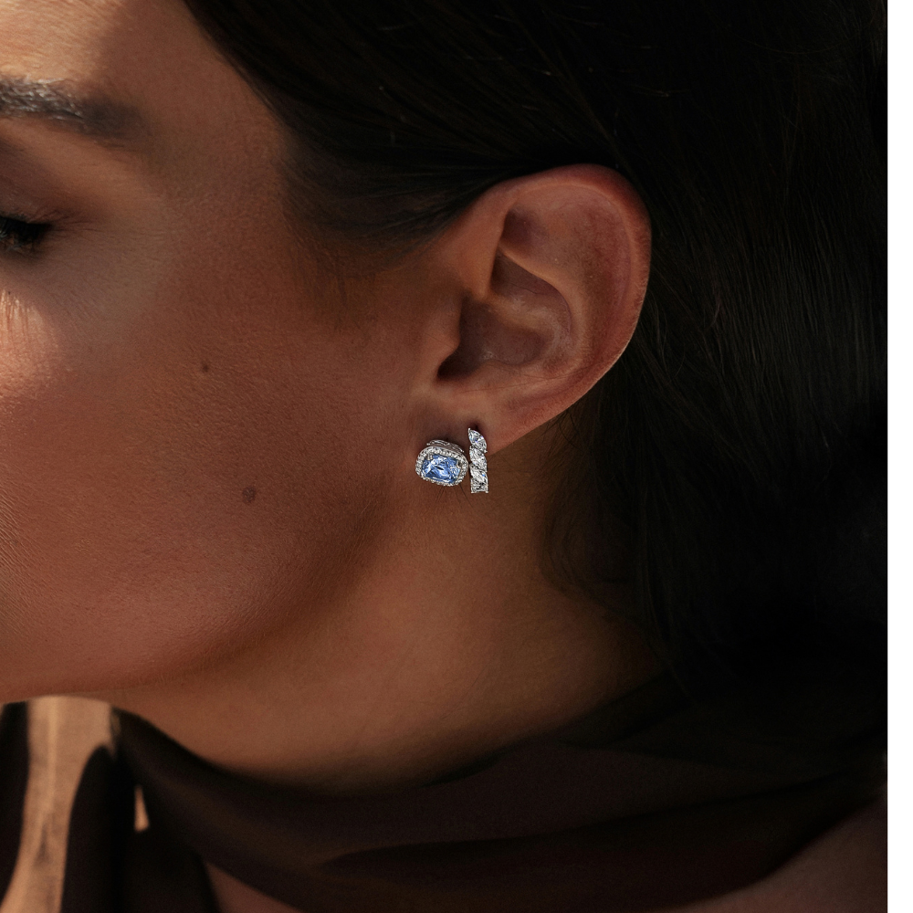 Cushion and Round Brilliant halo stud earrings with blue topaz simulants and 2.81 carats* of diamond simulants in sterling silver