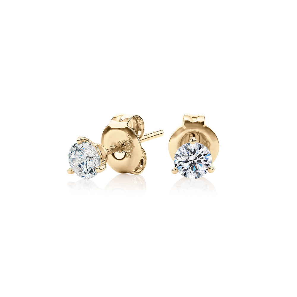 Round Brilliant stud earrings with 0.5 carats* of diamond simulants in 10 carat yellow gold