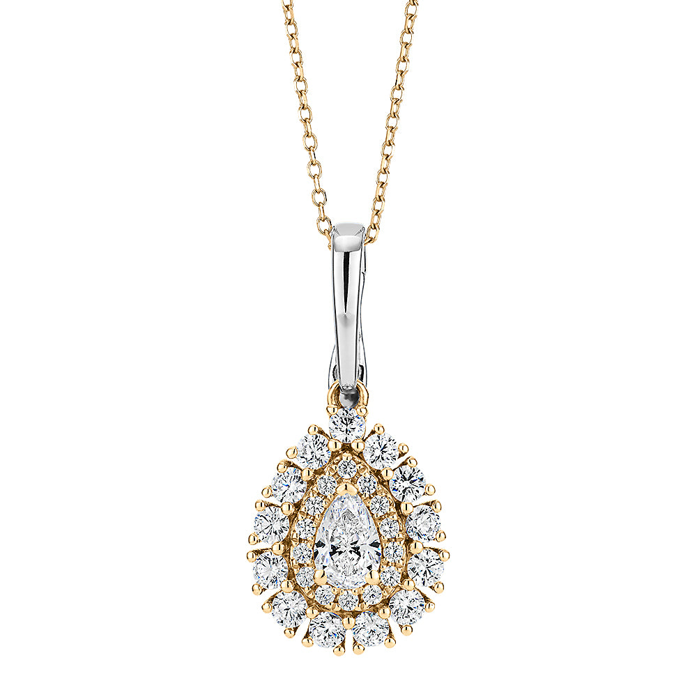 Fancy pendant with 0.91 carats* of diamond simulants in 10 carat yellow gold and sterling silver