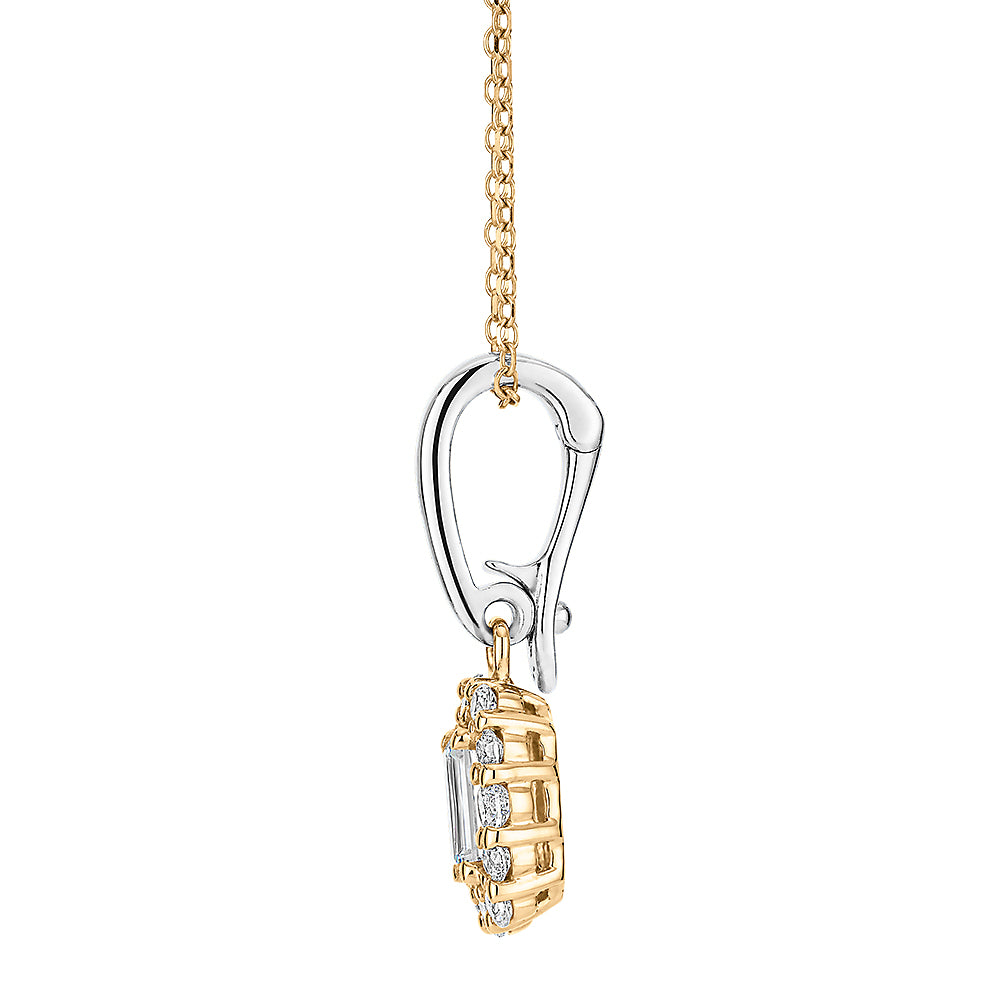 Fancy pendant with 0.53 carats* of diamond simulants in 10 carat yellow gold and sterling silver