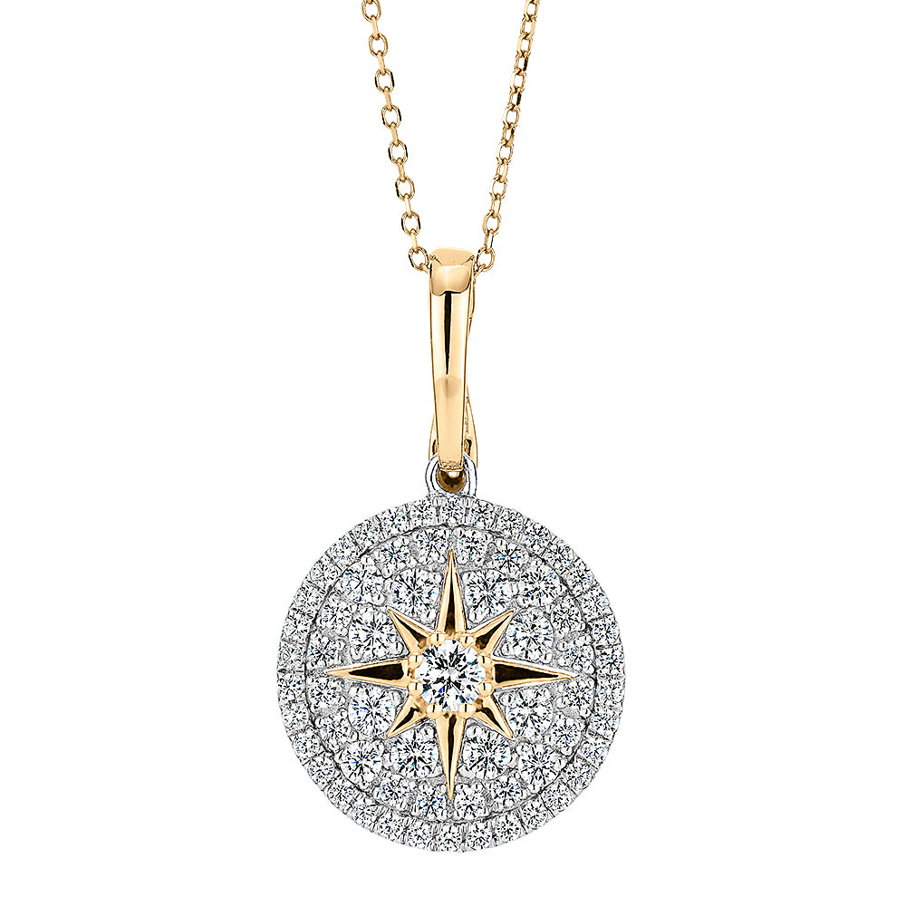 Fancy pendant with 0.95 carats* of diamond simulants in 10 carat yellow gold and sterling silver