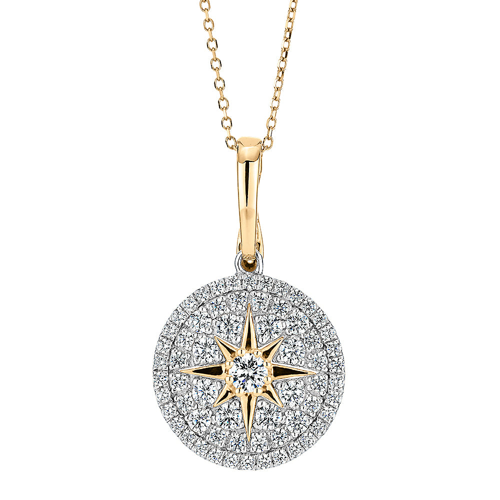 Fancy pendant with 0.95 carats* of diamond simulants in 10 carat yellow gold and sterling silver