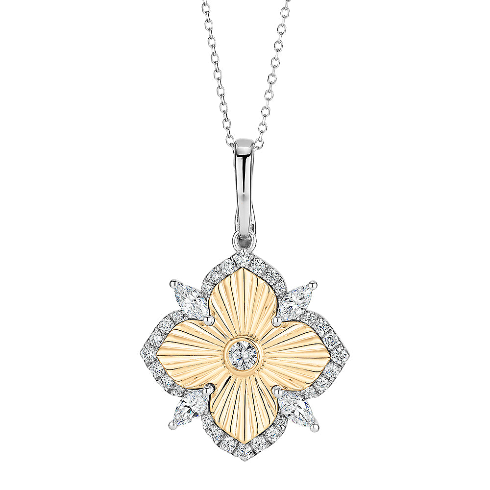 Fancy pendant with 0.97 carats* of diamond simulants in 10 carat yellow gold and sterling silver