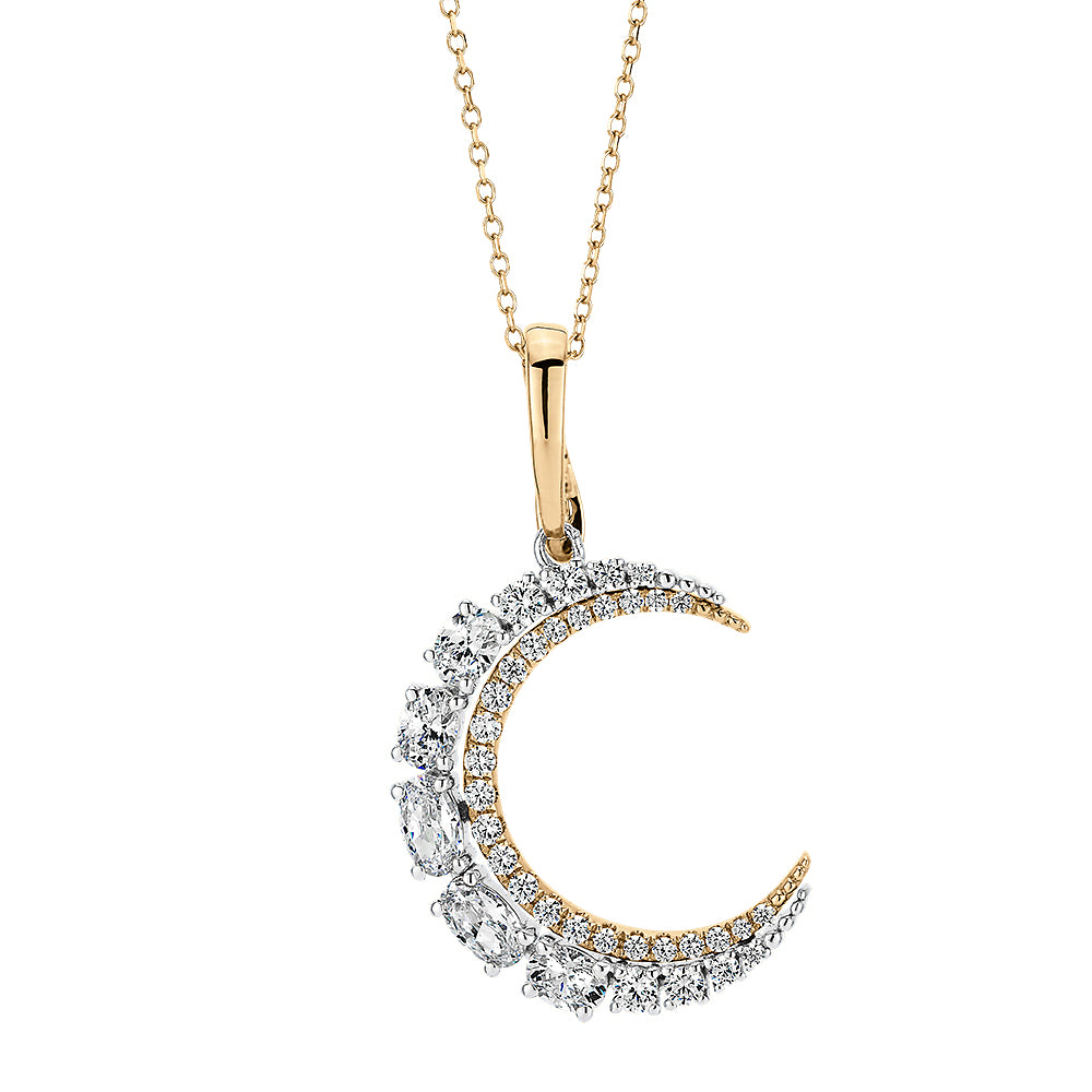 Fancy pendant with 1.12 carats* of diamond simulants in 10 carat yellow gold and sterling silver