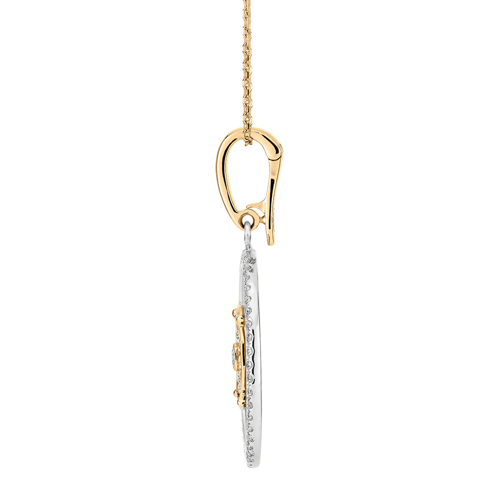 Fancy pendant with 0.36 carats* of diamond simulants in 10 carat yellow gold and sterling silver