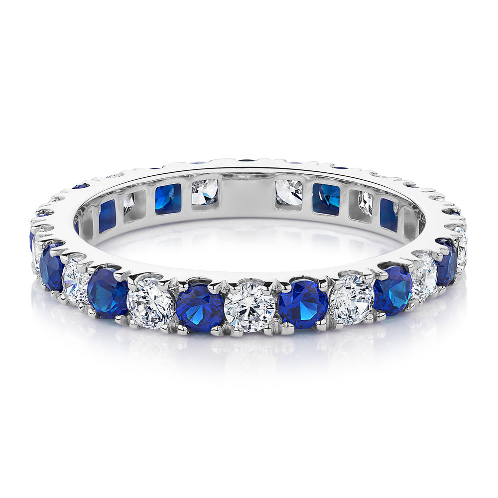 All-rounder eternity band with sapphire simulants and 0.78 carats* of diamond simulants in 14 carat white gold