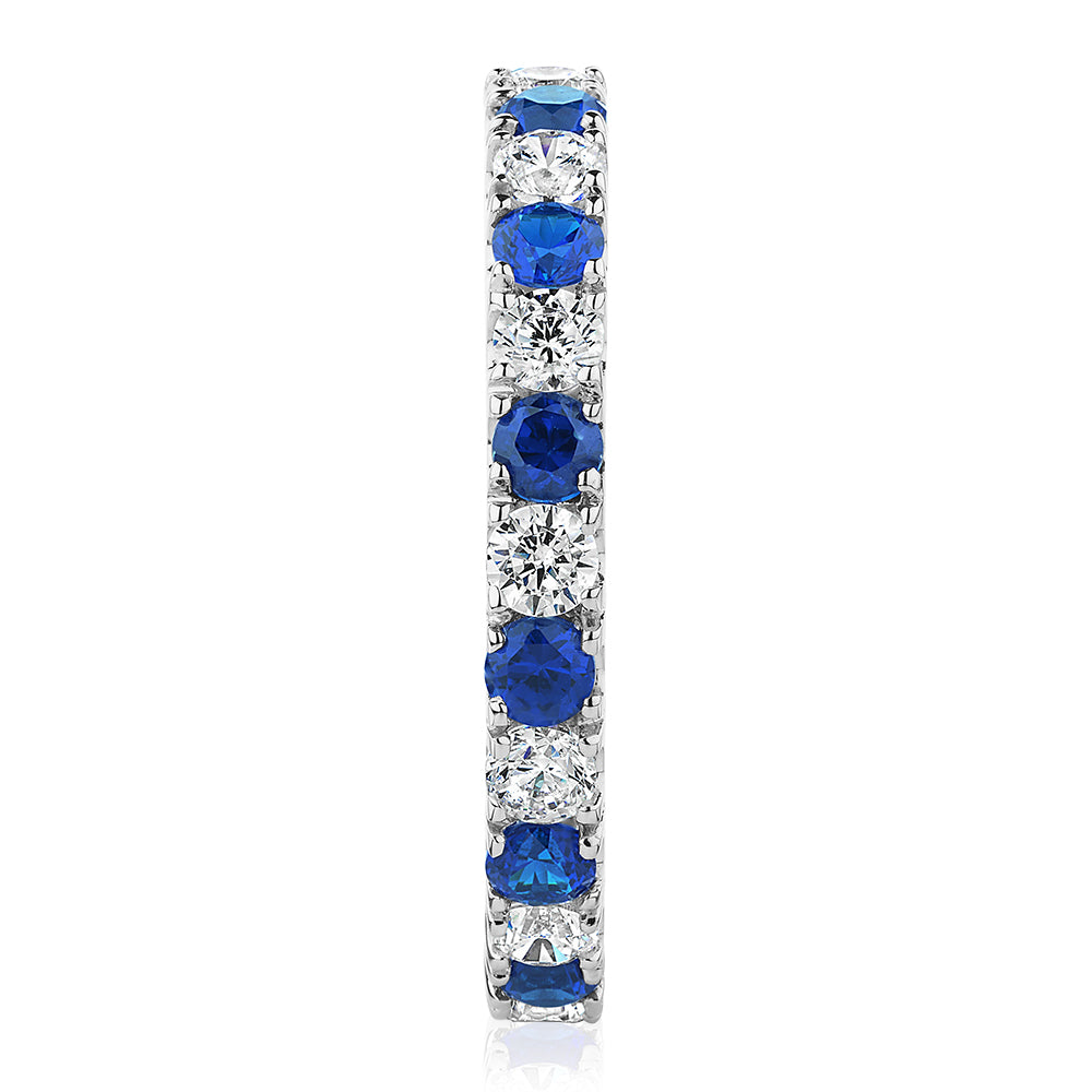 All-rounder eternity band with sapphire simulants and 0.78 carats* of diamond simulants in 14 carat white gold