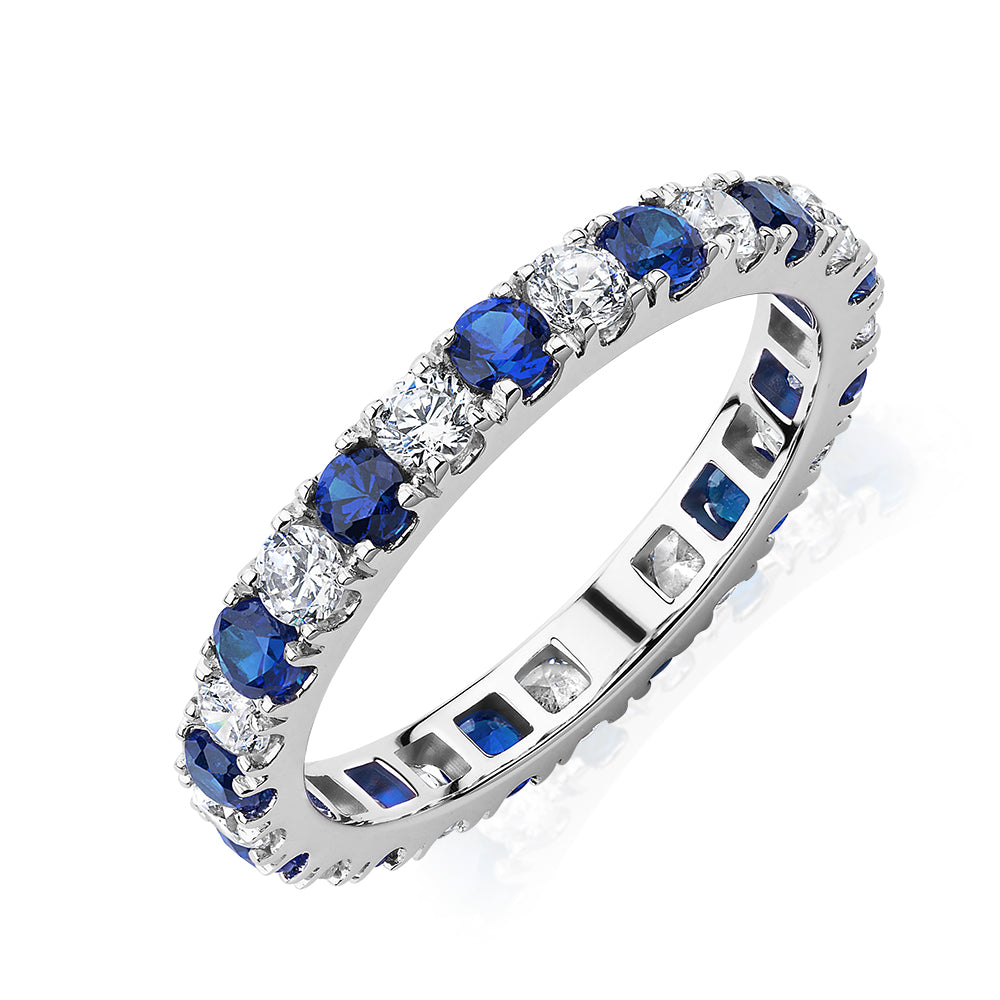All-rounder eternity band with sapphire simulants and 0.78 carats* of diamond simulants in 14 carat white gold