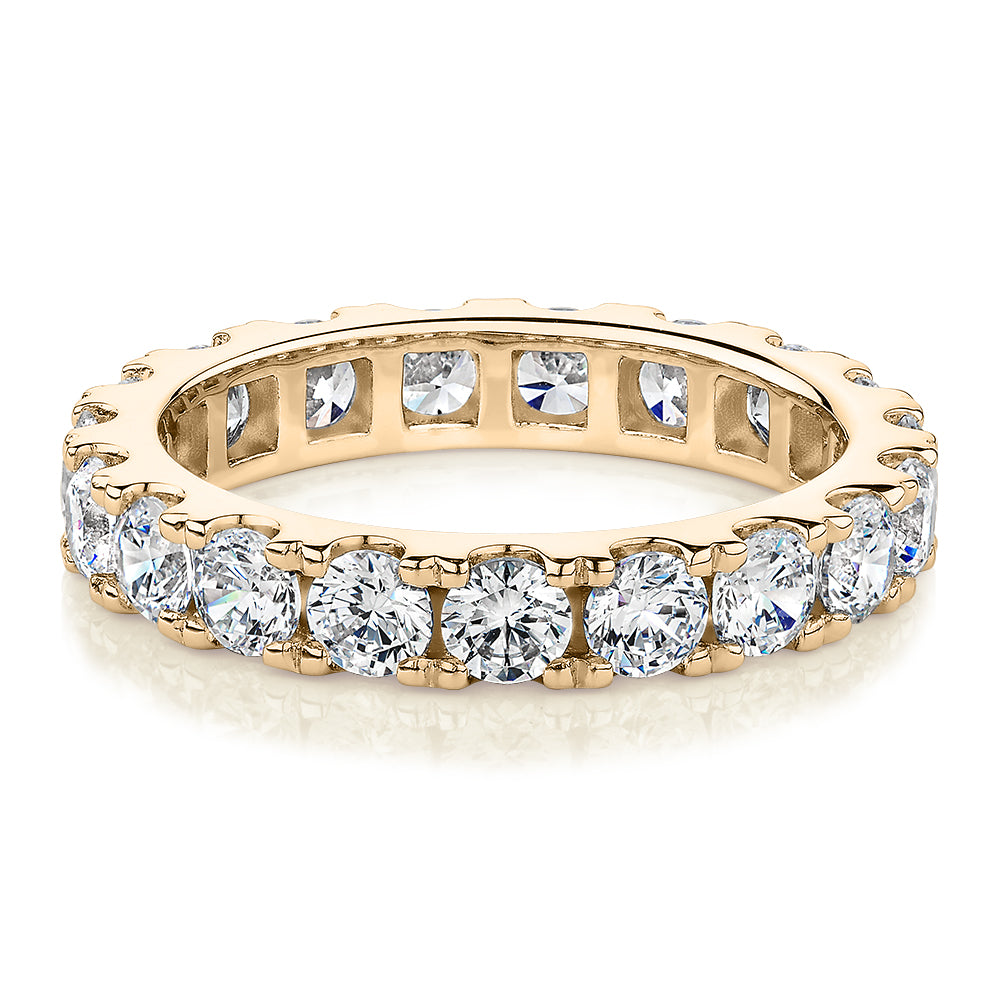 All-rounder eternity band with 2.09 carats* of diamond simulants in 14 carat yellow gold