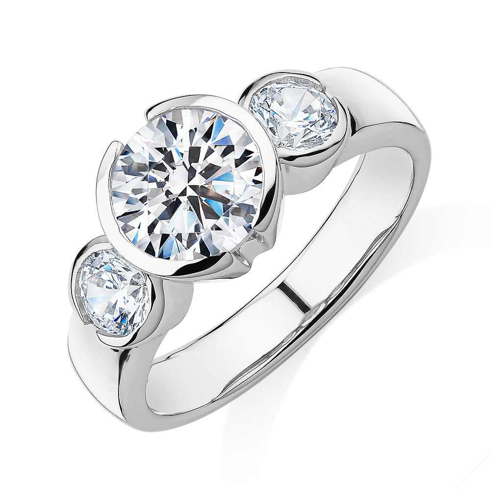 Three stone ring with 2.23 carats* of diamond simulants in 10 carat white gold