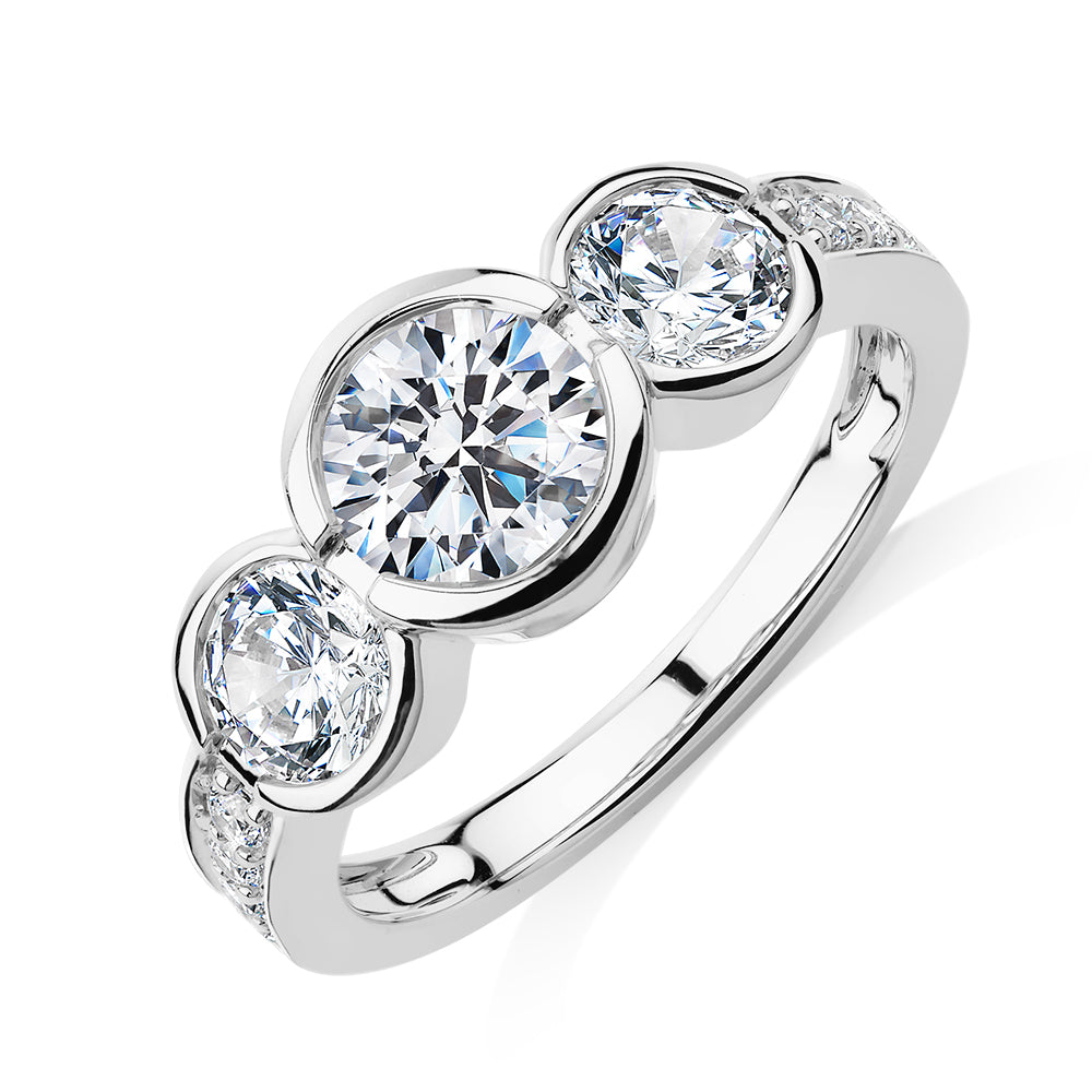 Three stone ring with 2.11 carats* of diamond simulants in 10 carat white gold