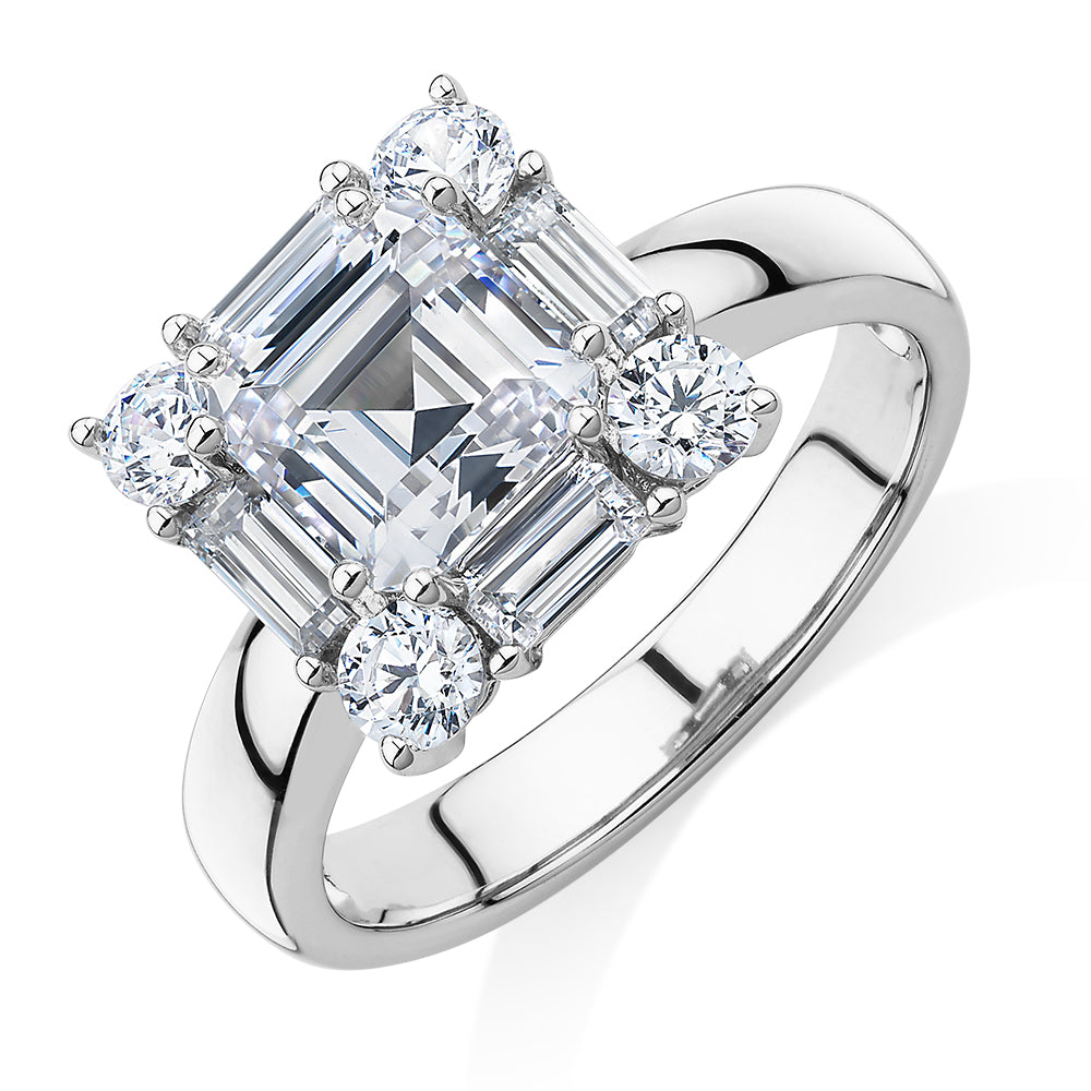 Princess Cut, Baguette and Round Brilliant halo engagement ring with 2.59 carats* of diamond simulants in 10 carat white gold