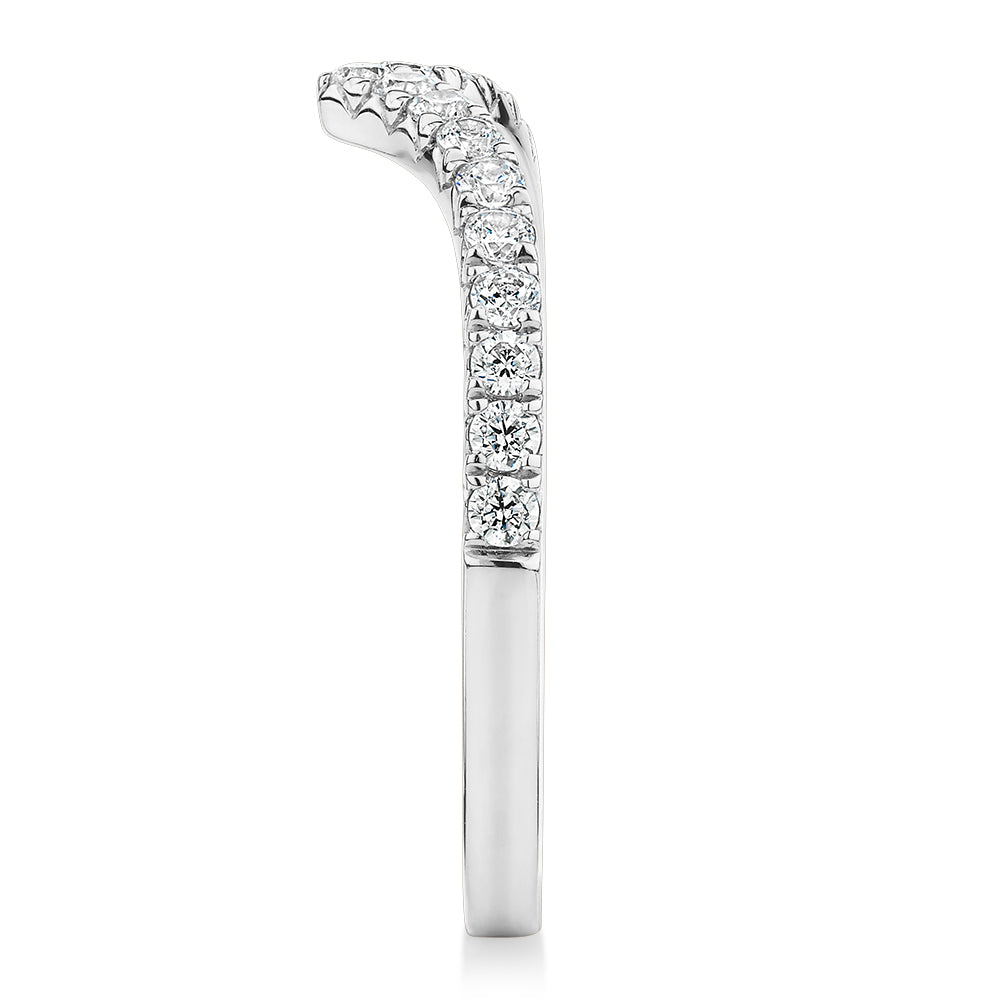 Round Brilliant curved wedding or eternity band with 0.57 carats* of diamond simulants in 10 carat white gold