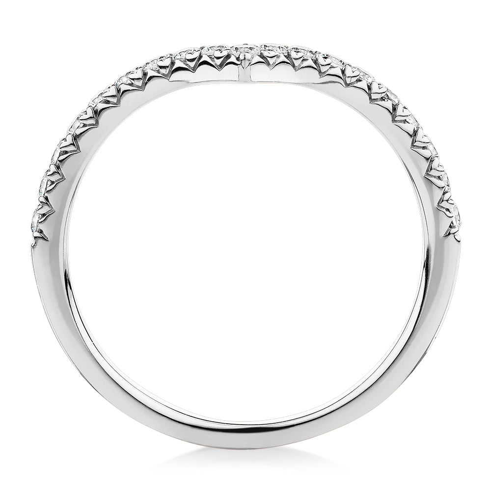 Round Brilliant curved wedding or eternity band with 0.57 carats* of diamond simulants in 10 carat white gold