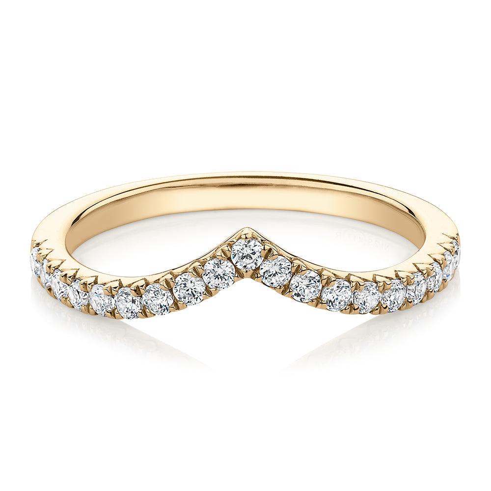 Round Brilliant curved wedding or eternity band with 0.57 carats* of diamond simulants in 10 carat yellow gold