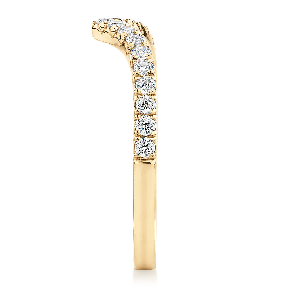 Round Brilliant curved wedding or eternity band with 0.57 carats* of diamond simulants in 10 carat yellow gold