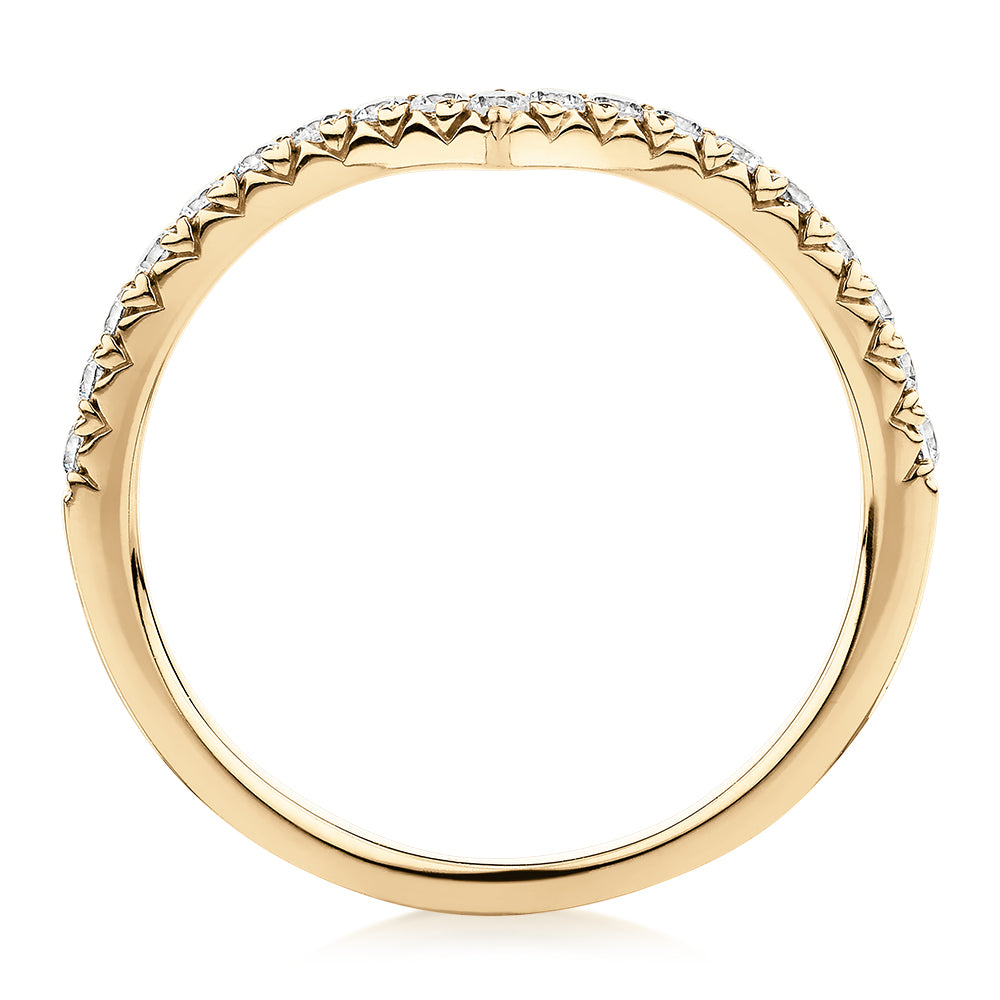 Round Brilliant curved wedding or eternity band with 0.57 carats* of diamond simulants in 10 carat yellow gold