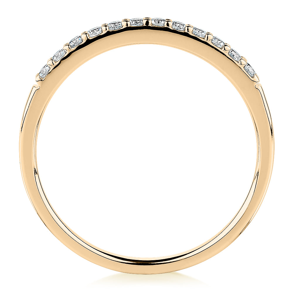 Wedding or eternity band in 14 carat yellow gold