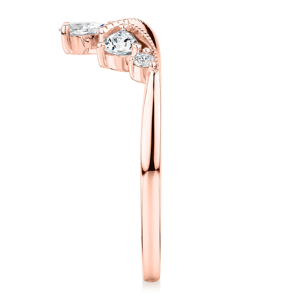Pear curved wedding or eternity band with 0.66 carats* of diamond simulants in 10 carat rose gold