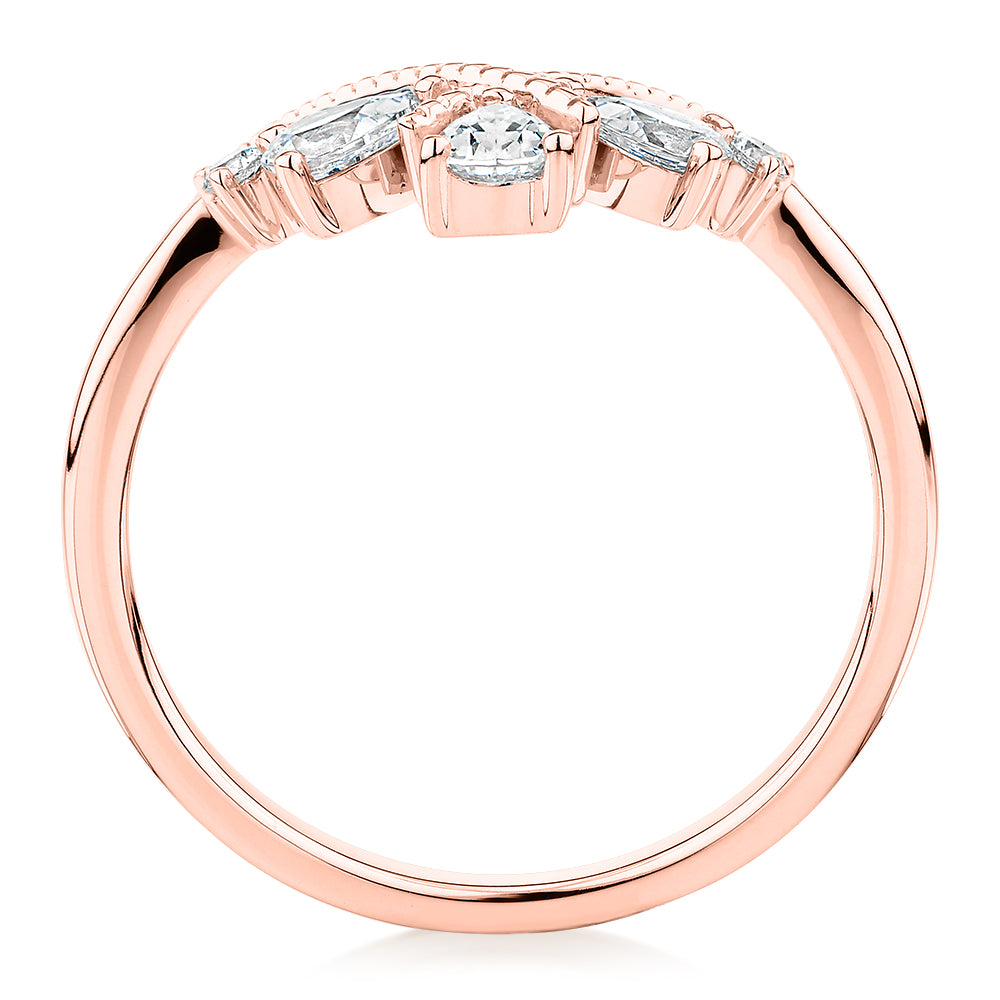 Pear curved wedding or eternity band with 0.66 carats* of diamond simulants in 10 carat rose gold