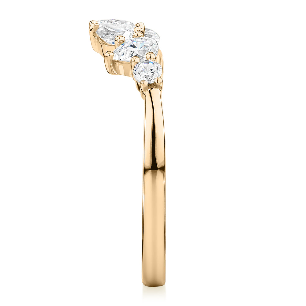 Pear curved wedding or eternity band with 0.92 carats* of diamond simulants in 10 carat yellow gold