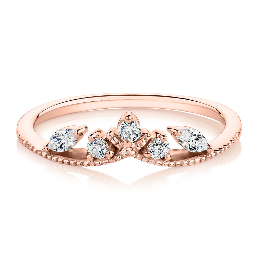 Round Brilliant curved wedding or eternity band with 0.29 carats* of diamond simulants in 10 carat rose gold