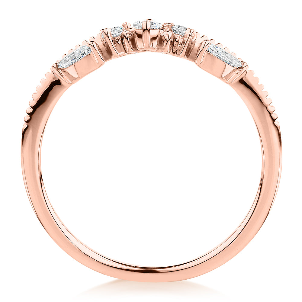 Round Brilliant curved wedding or eternity band with 0.29 carats* of diamond simulants in 10 carat rose gold