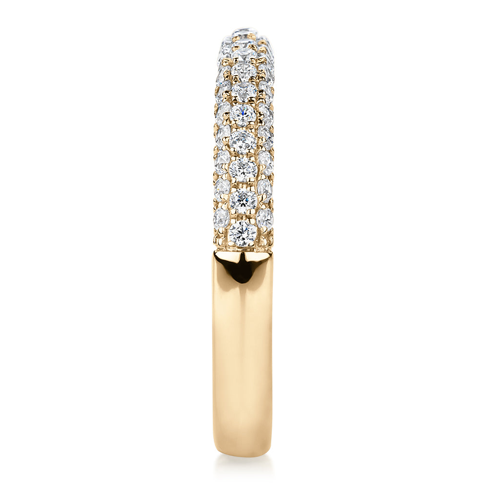 Wedding or eternity band with 0.43 carats* of diamond simulants in 10 carat yellow gold