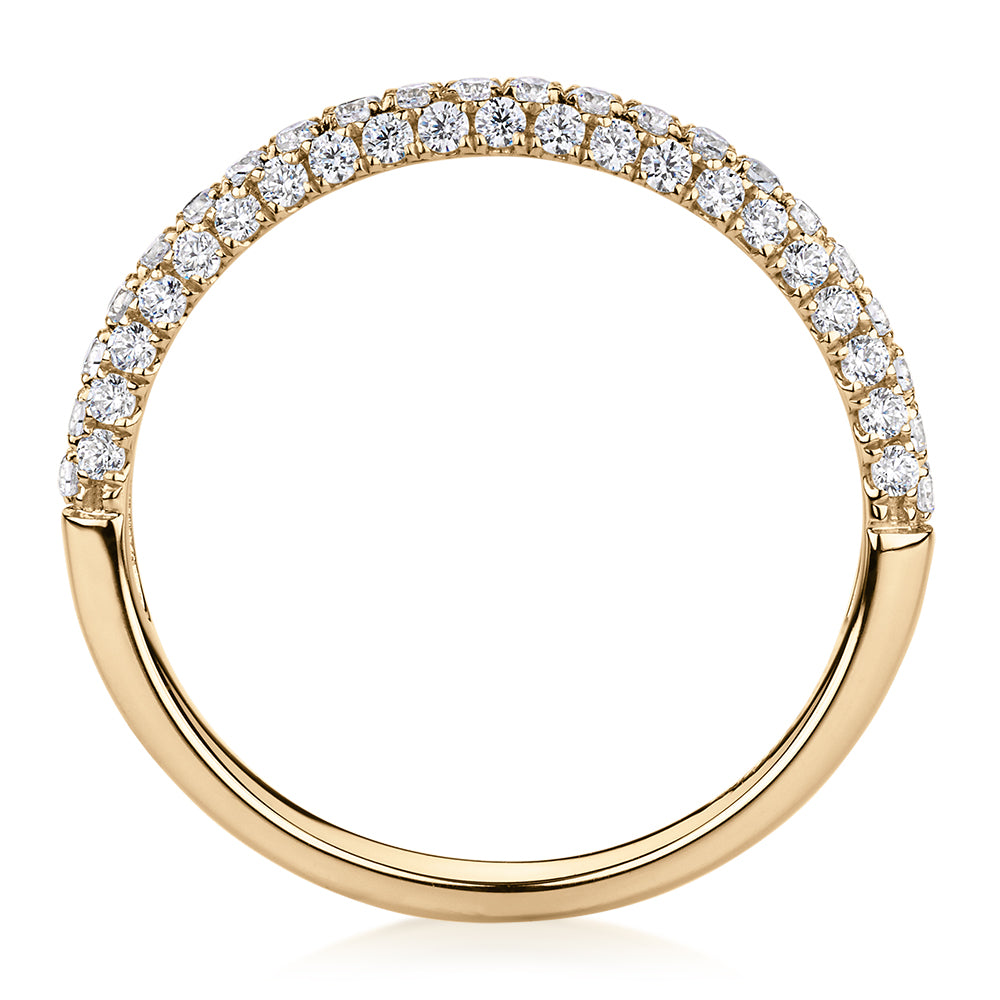Wedding or eternity band with 0.43 carats* of diamond simulants in 10 carat yellow gold
