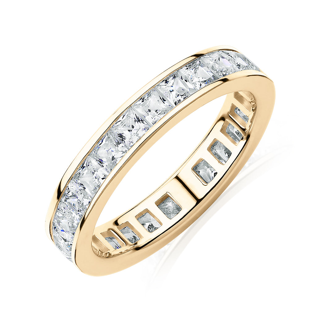 All-rounder eternity band with 2.5 carats* of diamond simulants in 10 carat yellow gold