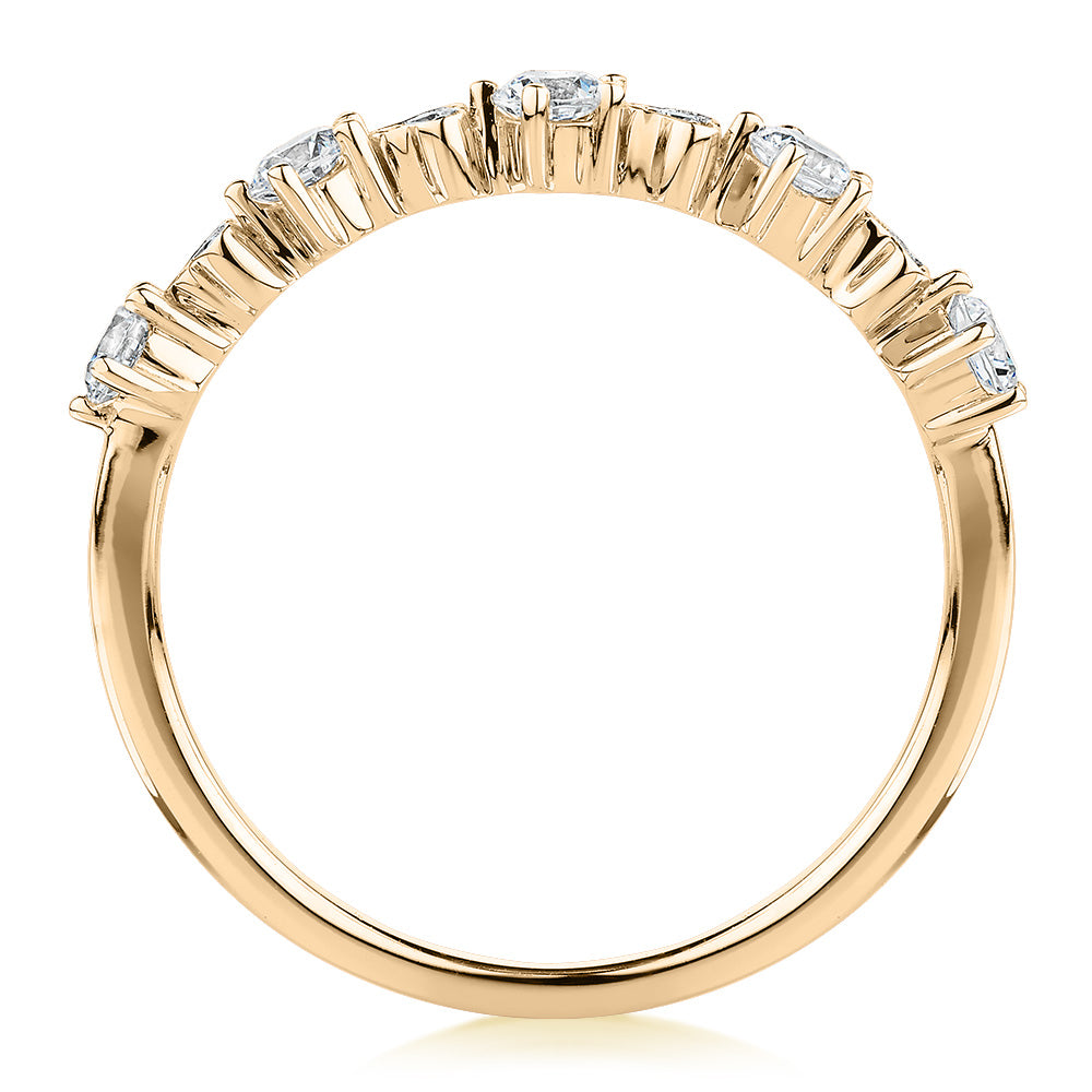 Wedding or eternity band with 0.32 carats* of diamond simulants in 10 carat yellow gold