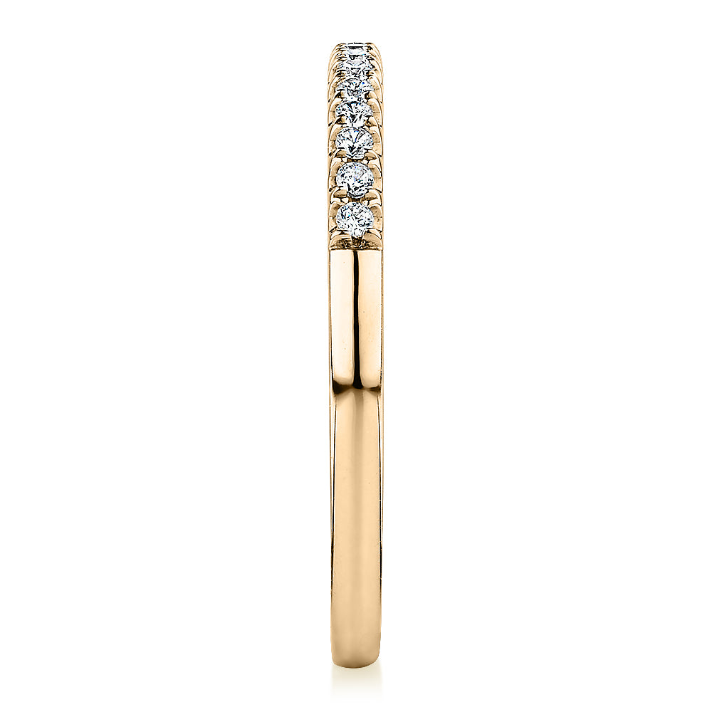 Wedding or eternity band in 14 carat yellow gold