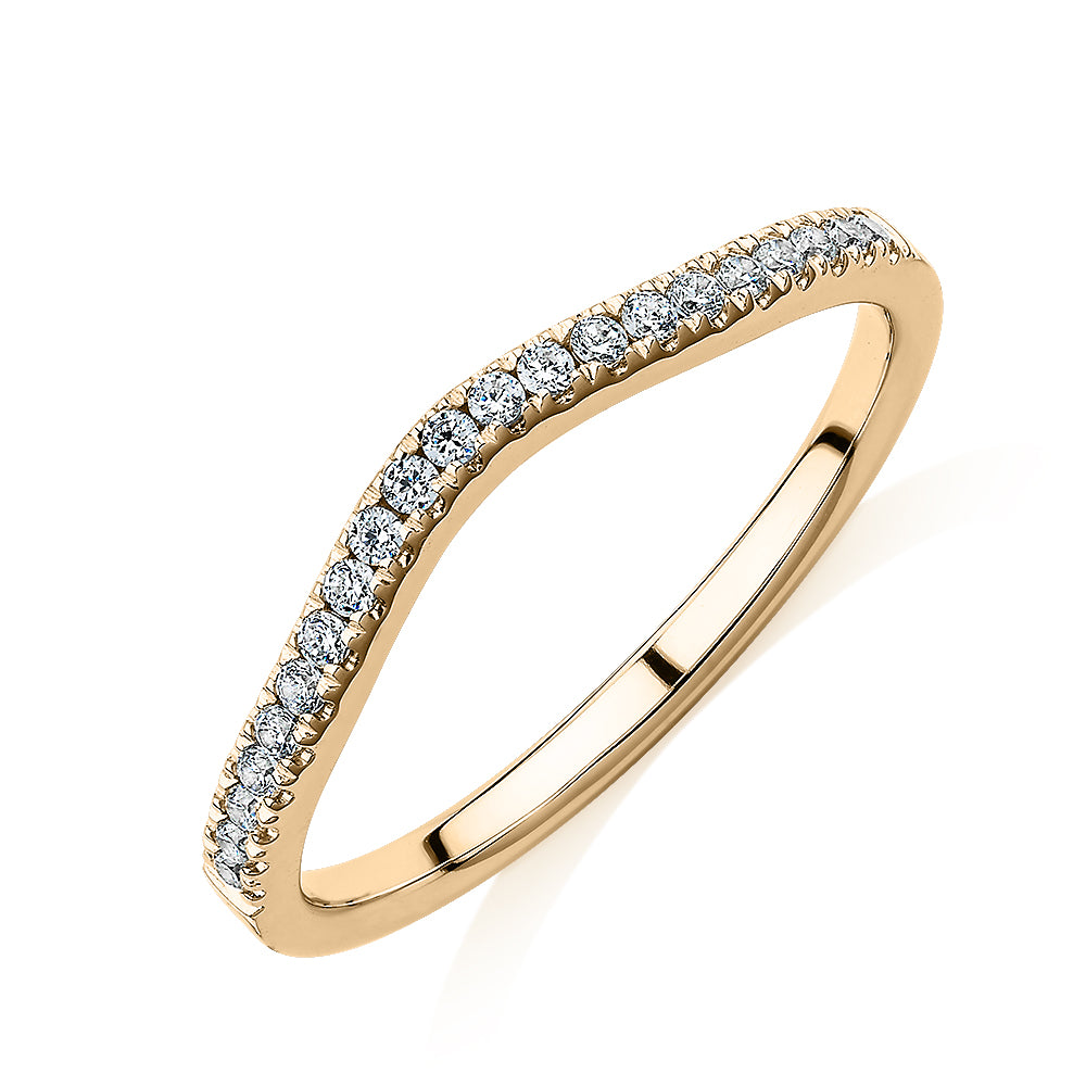 Curved wedding or eternity band in 14 carat yellow gold
