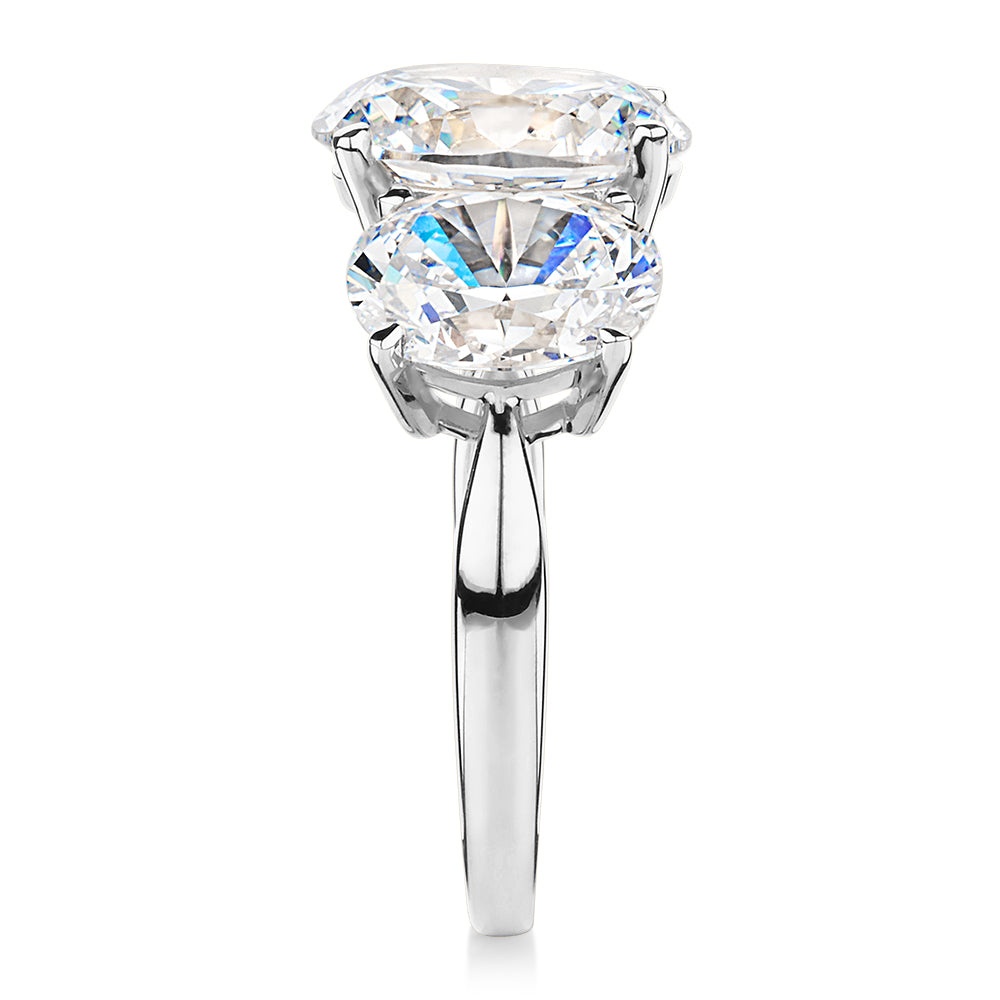 Three stone ring with 7.57 carats* of diamond simulants in 10 carat white gold