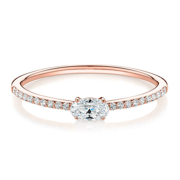 Dress ring with 0.31 carats* of diamond simulants in 10 carat rose gold