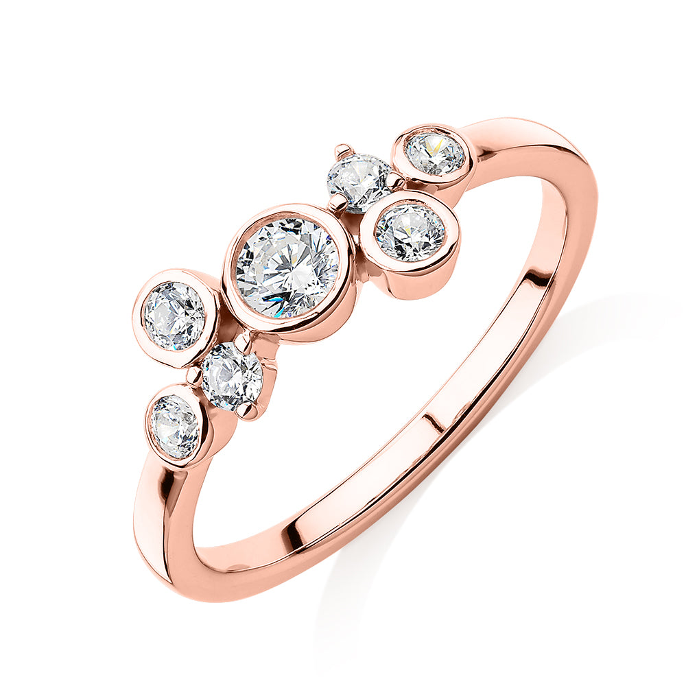 Dress ring with 0.39 carats* of diamond simulants in 10 carat rose gold