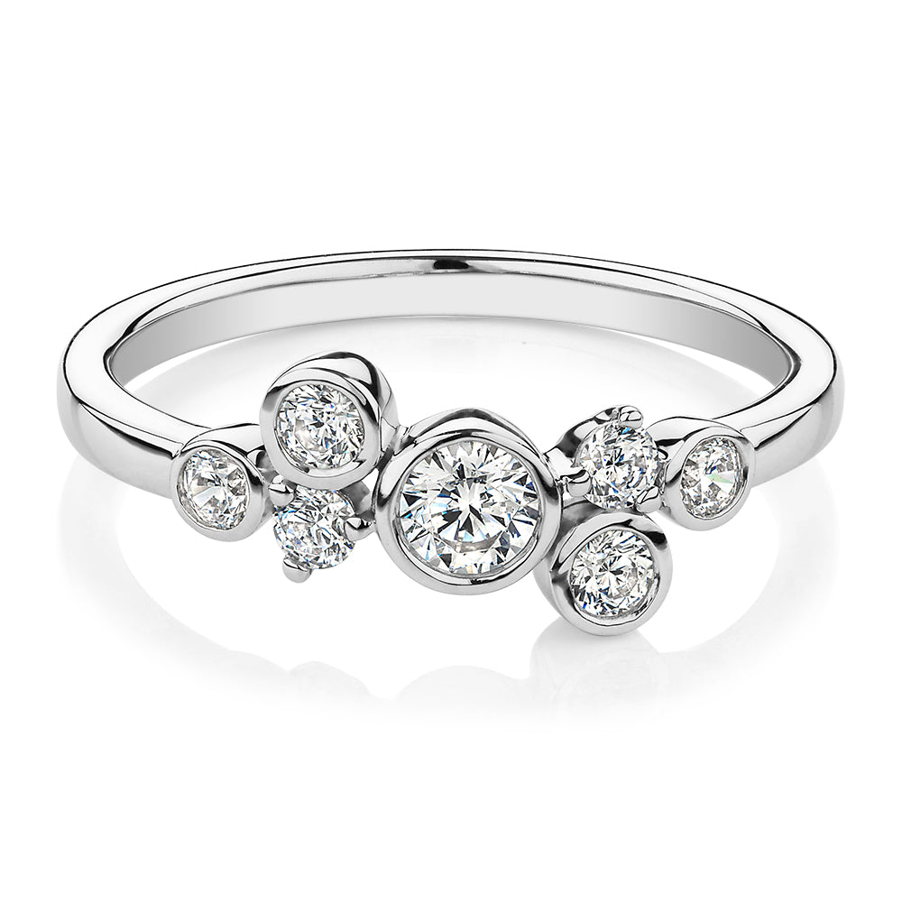 Dress ring with 0.39 carats* of diamond simulants in 10 carat white gold