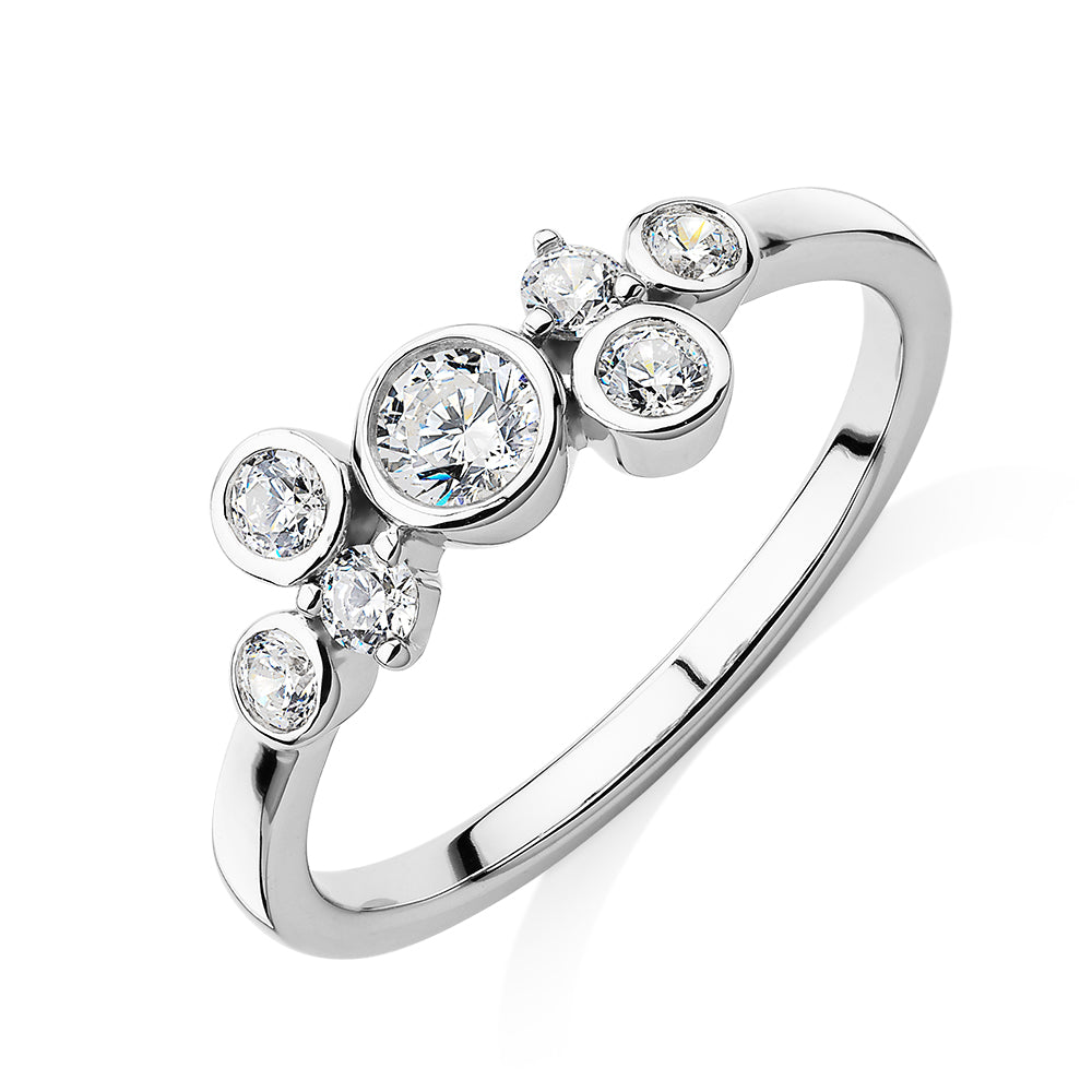Dress ring with 0.39 carats* of diamond simulants in 10 carat white gold