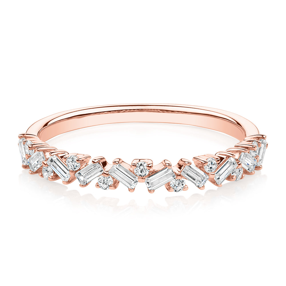Dress ring with 0.56 carats* of diamond simulants in 10 carat rose gold