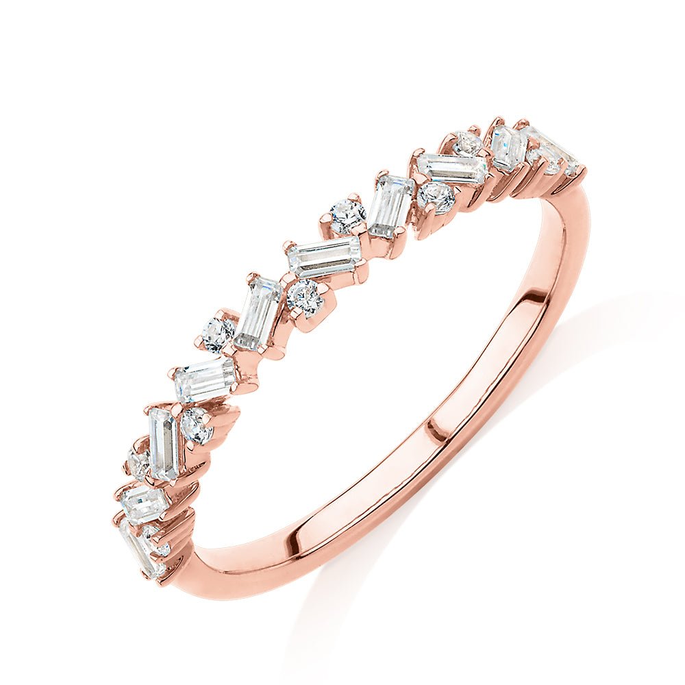 Dress ring with 0.56 carats* of diamond simulants in 10 carat rose gold