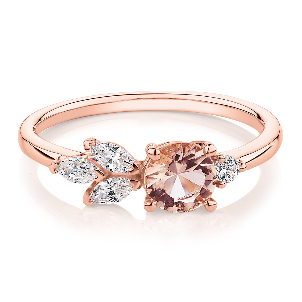 Round Brilliant and Marquise toi et moi shouldered engagement ring with morganite simulant and 0.33 carats* of diamond simulants in 10 carat rose gold