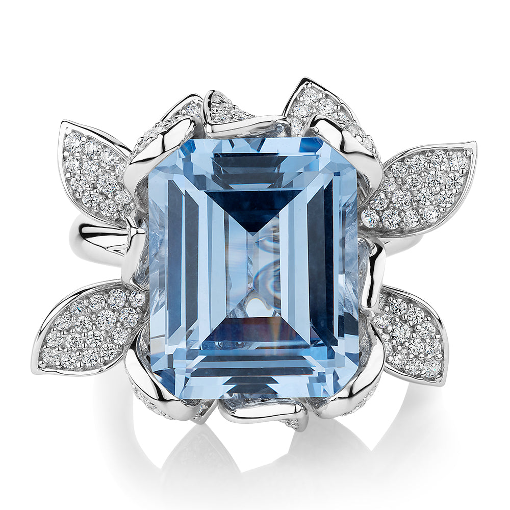 Dress ring with aquamarine simulant and 1.74 carats* of diamond simulants in sterling silver