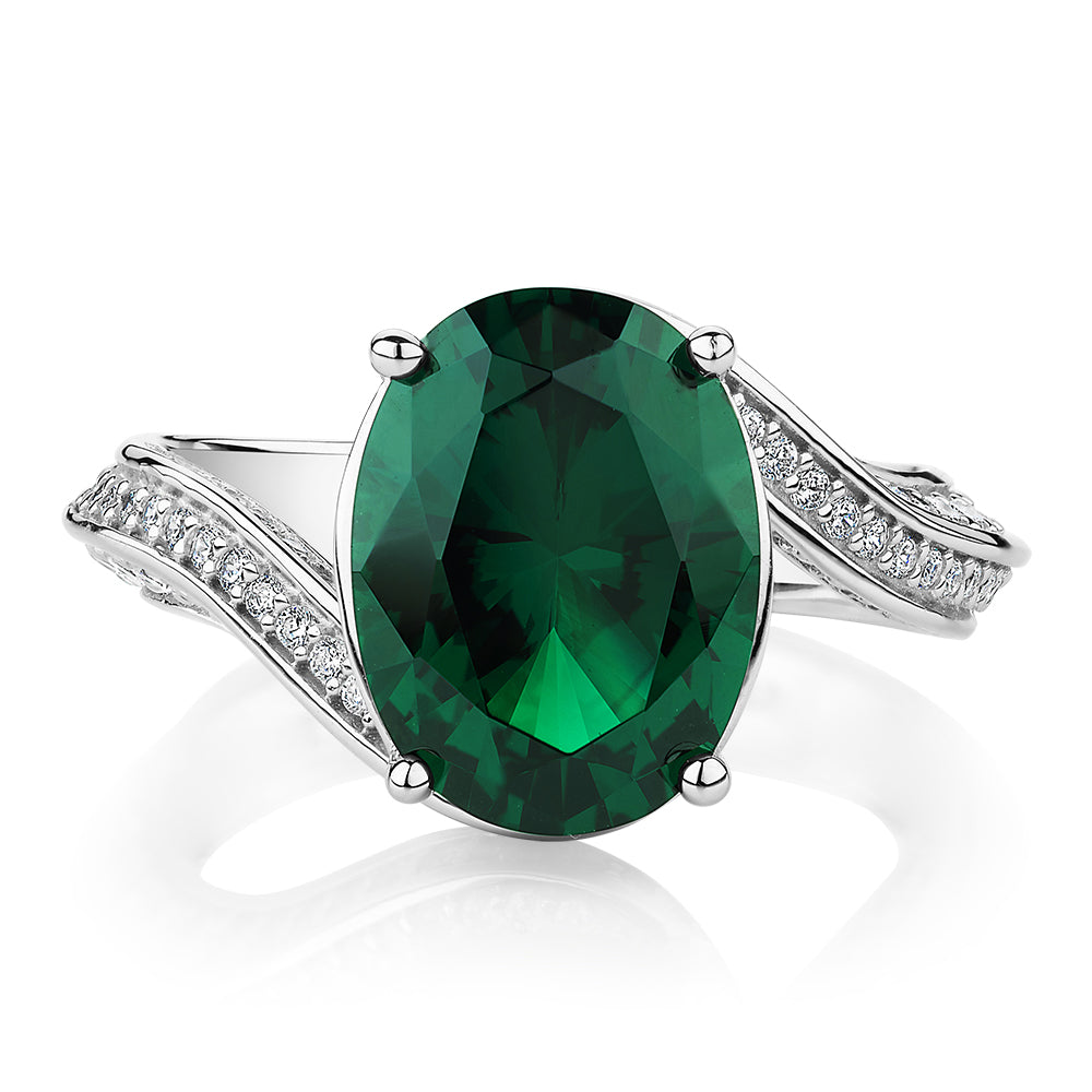 Dress ring with emerald simulant and 0.82 carats* of diamond simulants in sterling silver