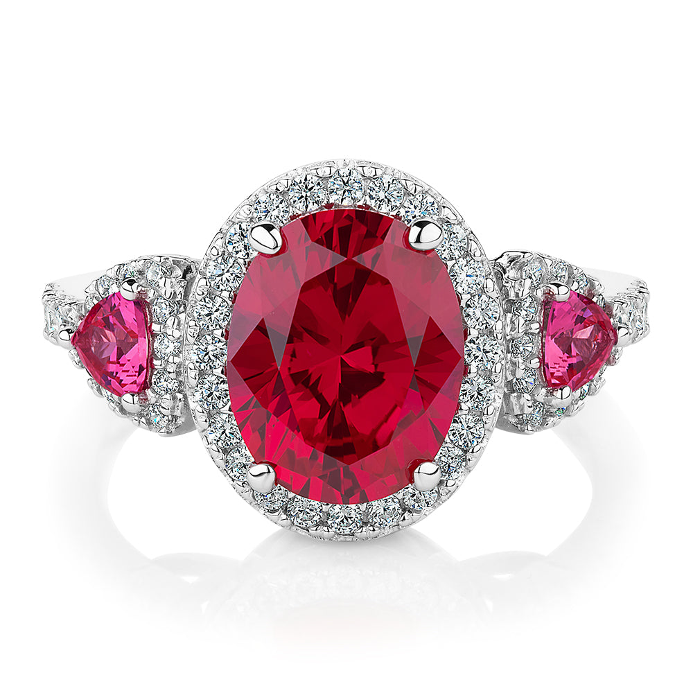 Dress ring with ruby simulants and 0.48 carats* of diamond simulants in sterling silver