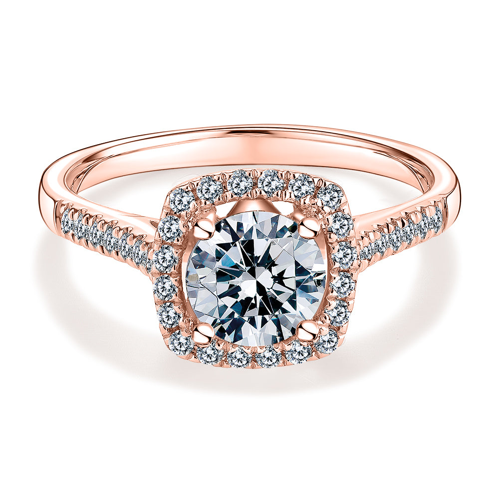 Round Brilliant halo engagement ring with 1.26 carats* of diamond simulants in 14 carat rose gold