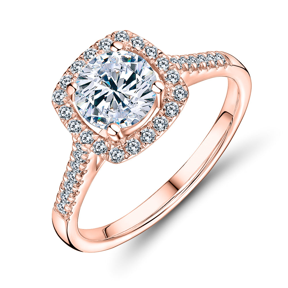 Round Brilliant halo engagement ring with 1.26 carats* of diamond simulants in 14 carat rose gold